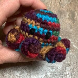 Crochet dark multicolored mini octopus